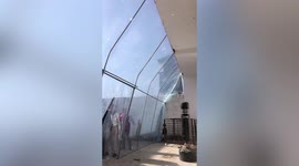 Chinese parents build sun shed so their daughter-in-law can enjoy sunshine while recovering from labour