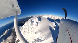 Flying over Garibaldi Mountain during winter season in Squamish, British Columbia, Canada.