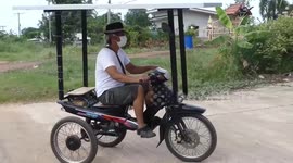 Thai man transforms motorcycle into solar-powered eco-friendly tricycle 'to save on fuel costs'