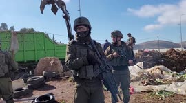 An Israeli bulldozer razes Palestinian agricultural lands in al-Hijri village south of Hebron in the West Bank