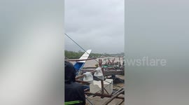 Dramatic moment fishing boats are crushed as super typhoon Rai ravages the Philippines
