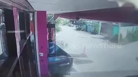 Speeding pickup truck rams into barbershop in Thailand