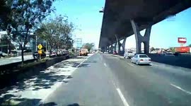 Truck wheel comes loose on road in Thailand