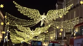 The Spirit of Christmas angels shine golden light onto Regent Street St James's