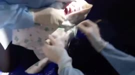Burmese woman fleeing clashes in homeland gives birth on border with Thaialnd