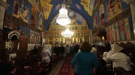 Palestinian Christians attend a mass on Christmas Eve, at St. Porphyrios Church in Gaza City