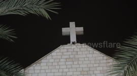 Palestinian Christians attend Christmas mass eve at the Roman Catholic Church of the Holy Family in Gaza City