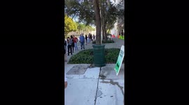 Hour long wait for COVID testing seen in Miami