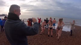 Swimmers in Brighton brave cold for Christmas Day dip