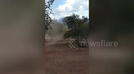 Dust devil tornado whips through family’s front yard in the Philippines
