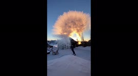 Spectacular scene shows boiling water turning into ice snow cloud in freezing Canadian cold