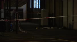 Police forensics team arrive at scene of reported double stabbing in Kilburn London