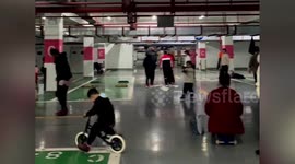Chinese residents risk playing at underground garage