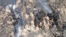 Repair works after a landslide caused by heavy rain in Bukit Tangga, Malaysia