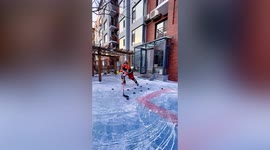 Chinese dad turns frozen household yard into hockey rink for son