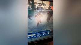 Repairmen narrowly escape tyre explosion during pump-up in China