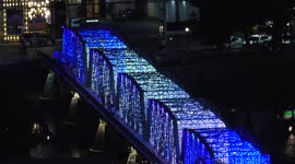 Spectacular Lighting on the old iron bridge crossing the River Ping in Chiang Mai, Thailand