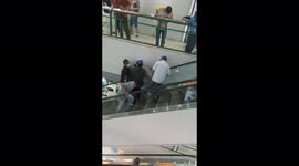 Indonesian man rescued after getting HEAD jammed in shopping mall escalator