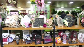 Palestinian vendors display gifts and decoration ahead of New Year's eve