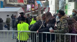 Times Square: New Year’s Eve revelers arrive at vaccination and security checkpoints