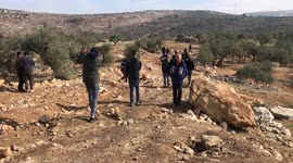 Palestinian protesters clash with Israeli security forces following a demonstration against settlements