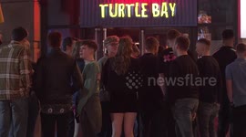 Hundreds of revellers celebrate on hottest New Year's eve since 1990 in the UK