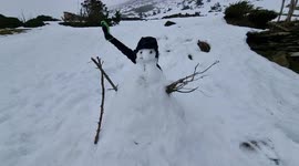 The french and funny Snowman wishes you a happy new year 2022.