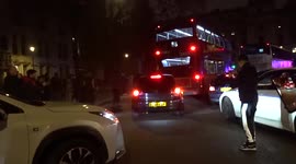 Car with a damaged exhaust brings traffic to a halt in Parliament Square on the New Year night