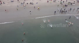 AERIAL VIEW: Annual Polar Bear Plunge in New York City's Coney Island