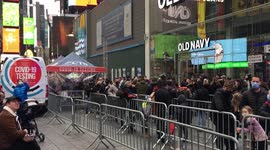 Covid-19 cases surge in New York City. Long lines in Times Square for testing.