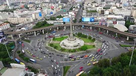 Time-lapse of traffic at Victory Monument statue in Bangkok, Thailand