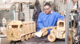 Palestinian cancer patient makes model vehicles from wood