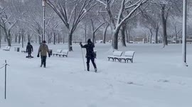 Man hilariously skies through Washington DC park after several inches of snow slam east coast