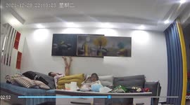 Framed pictures hit girl after younger sister accidentally kicks them off wall in China