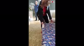 Daughter hides in Christmas present to surprise mother after years apart