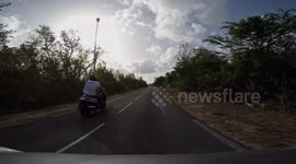 Driving on Rue De Sandy Ground from from Marigot on Saint Martin island - French part  with sunny sky in August