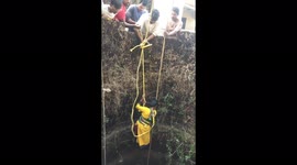 Brave animal-lover descends steep sides of well in southern India to rescue stricken dog