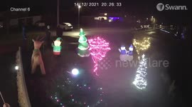 CCTV captures Christmas Grinch’s bizarre knife attack on inflatable tree