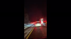 US: Hundreds Of Drivers Stranded Overnight After Snowstorm Shuts I-95 In Virginia