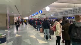 US: Staffing Shortages And Winter Weather Cause Long Waits At Airports 2