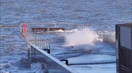 Tidal surge on the Thames floods jetty in Kent, UK