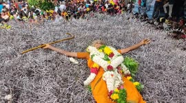 'Possessed' grandmother dances on heap of thorns during bizarre Indian festival
