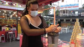 Thai street vendor whips up colourful milk frappes