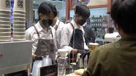 Coffee lovers enjoy cups of coffee at festival in Thailand