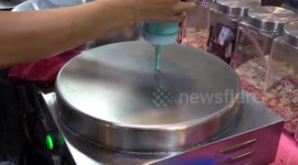 Thai food stall cooks cute and crispy rainbow-coloured crepes