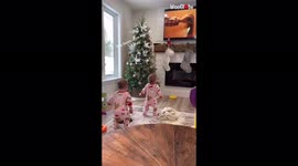 'Jolly twins getting ready for Christmas by dancing to Mariah Carey'