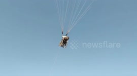 Handicapped man lives dream of parasailing along with his wheelchair in India