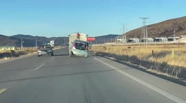 'Dancing' car sways from side to side while being towed by truck