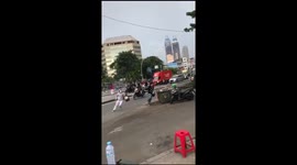 High school kids in Indonesia break out into armed street fight