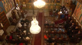 Palestinian Greek orthodox Christians attend the Christmas Eve Mass at St. Porphyrios Church according to the Eastern Orthodox calendar, in Gaza City